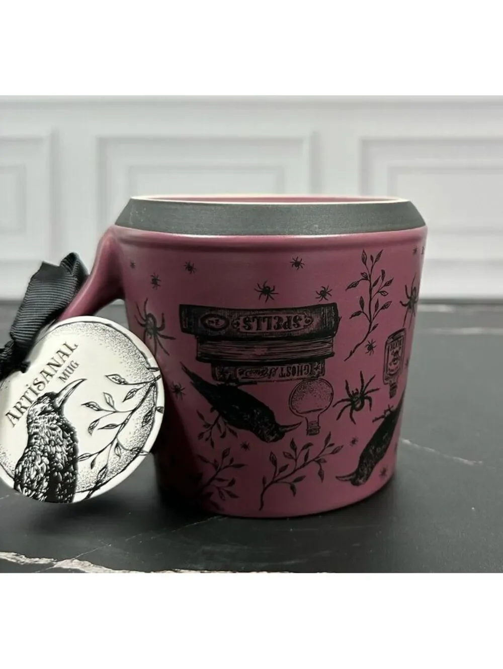 Connecting on Paper 2021 co. Crafted Ceramic Mug with Raven and Spellbook Design